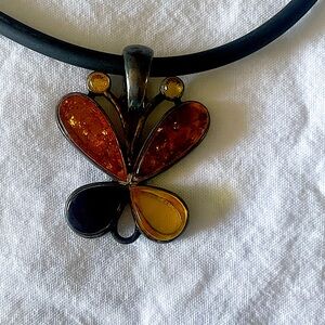 Amber butterfly 🦋 beautiful pendant with black leather cord